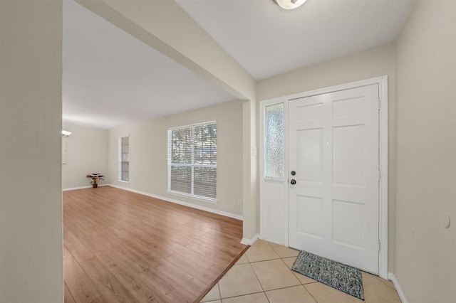 9039 Sandstone St, Houston, TX 77036 - foyer entrance featuring baseboards and light tile patterned flooring