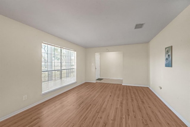 9039 Sandstone St, Houston, TX 77036 - spare room with light wood-style floors and baseboards