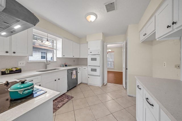 9039 Sandstone St, Houston, TX 77036 - kitchen with dishwasher, a sink, wall chimney exhaust hood, white cabinetry, and light tile patterned flooring