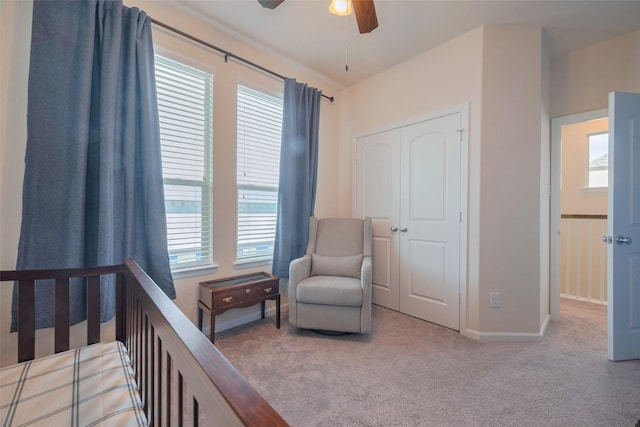 10712 Addicks Oaks Pl, Houston, TX 77043 - carpeted bedroom with multiple windows, baseboards, and ceiling fan