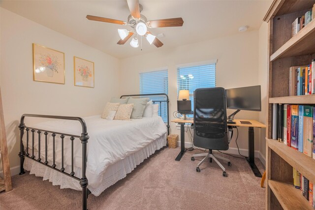 10712 Addicks Oaks Pl, Houston, TX 77043 - bedroom featuring carpet flooring, baseboards, and ceiling fan