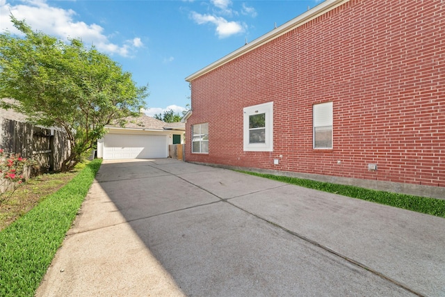 12236 S Shadow Cove Dr, Houston, TX 77082 - view of property exterior with brick siding and a garage