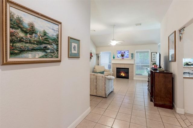 1511 Ashley Ct, Tomball, TX 77375 - corridor with baseboards, light tile patterned floors, and vaulted ceiling