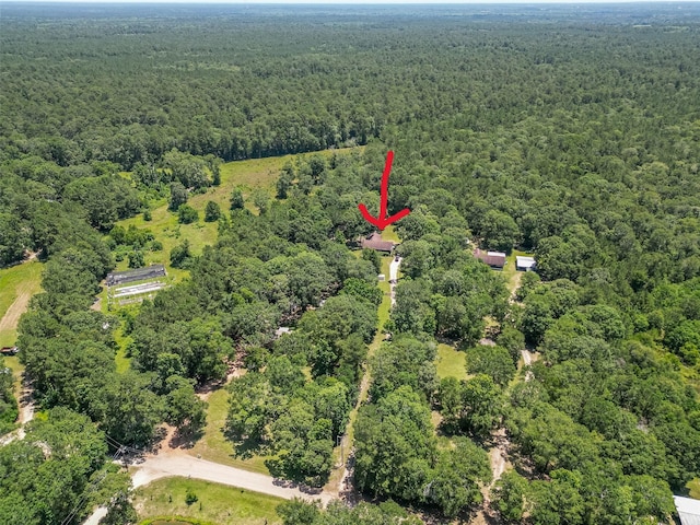 200 Little Pine Valley Rd, Cleveland, TX 77328 - drone / aerial view of a heavily wooded area