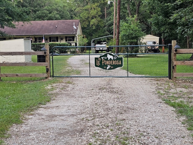 200 Little Pine Valley Rd, Cleveland, TX 77328 - view of gate
