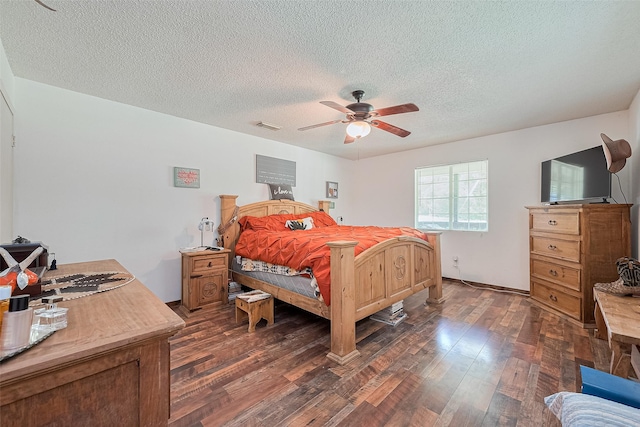 200 Little Pine Valley Rd, Cleveland, TX 77328 - bedroom featuring dark wood-style floors, a textured ceiling, and ceiling fan