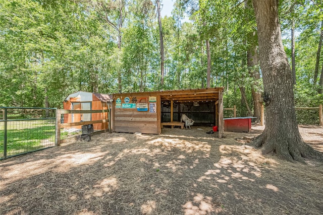 200 Little Pine Valley Rd, Cleveland, TX 77328 - view of yard featuring an outdoor structure