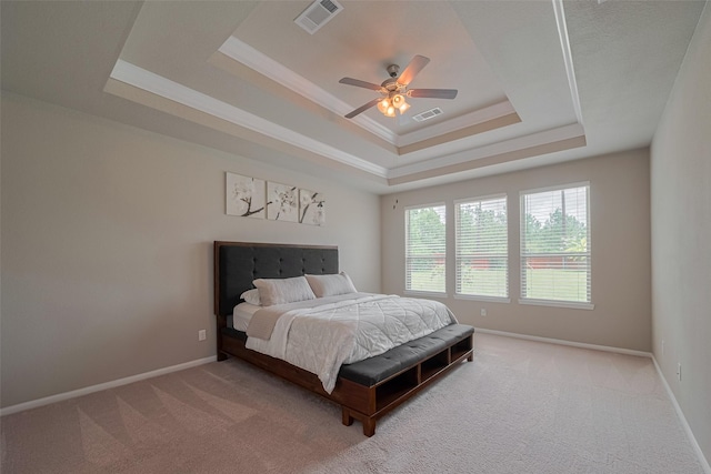 25203 Azel Shore Ct, Porter, TX 77365 - carpeted bedroom featuring a raised ceiling, crown molding, and a ceiling fan
