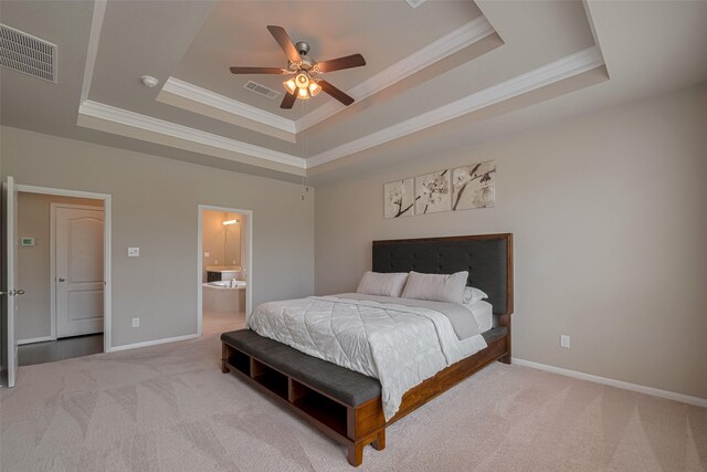 25203 Azel Shore Ct, Porter, TX 77365 - carpeted bedroom with a tray ceiling, crown molding, ensuite bathroom, and ceiling fan
