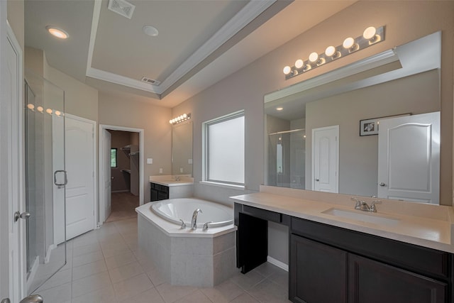 25203 Azel Shore Ct, Porter, TX 77365 - full bathroom with a stall shower, two vanities, tile patterned floors, and a garden tub