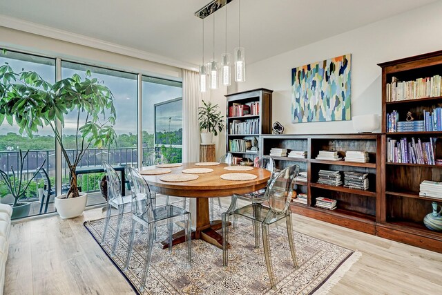 2200 Willowick Rd Unit 4E, Houston, TX 77027 - dining space featuring wood finished floors