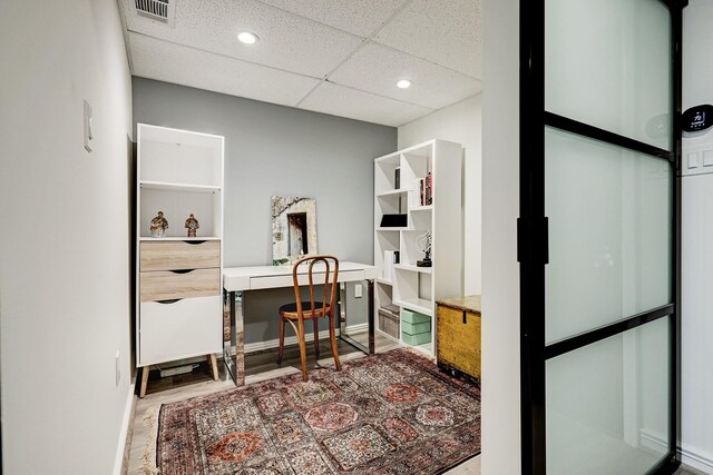 2200 Willowick Rd Unit 4E, Houston, TX 77027 - office area with wood finished floors, recessed lighting, baseboards, and a drop ceiling