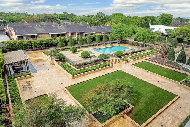2200 Willowick Rd Unit 4E, Houston, TX 77027 - view of swimming pool with a garden