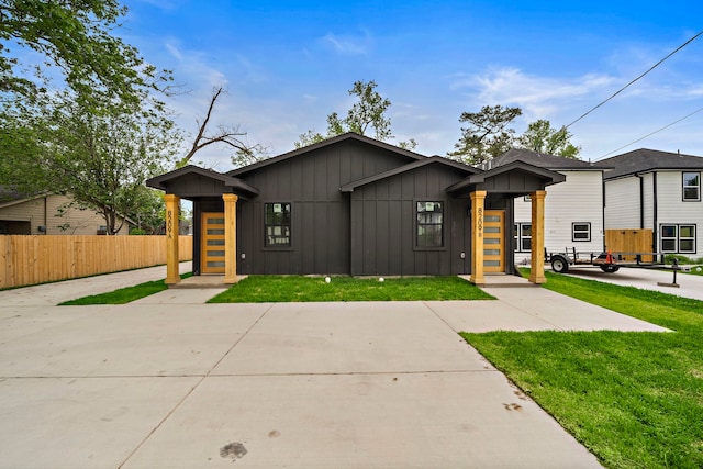 8209 Richland St A/B, Unit A/B Houston, TX 77028 - view of front facade featuring board and batten siding
