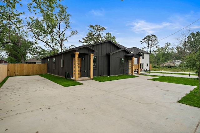 8209 Richland St A/B, Unit A/B Houston, TX 77028 - contemporary home with board and batten siding