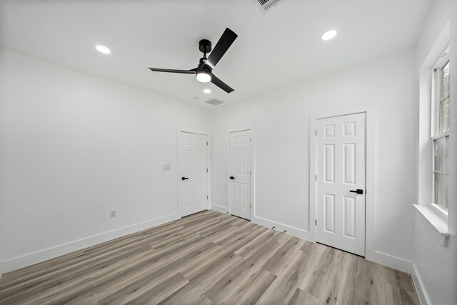 8209 Richland St A/B, Unit A/B Houston, TX 77028 - unfurnished bedroom featuring light wood-style flooring, baseboards, recessed lighting, and ceiling fan