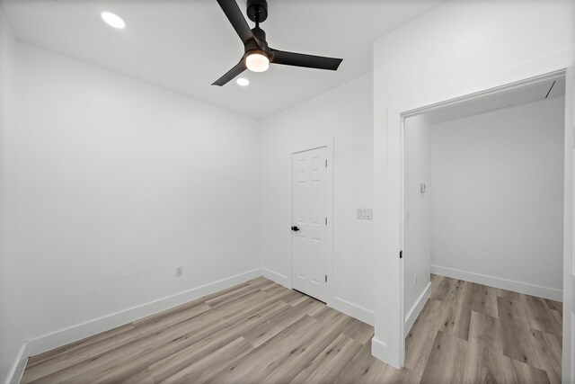 8209 Richland St A/B, Unit A/B Houston, TX 77028 - unfurnished bedroom featuring light wood-type flooring, baseboards, recessed lighting, and a ceiling fan