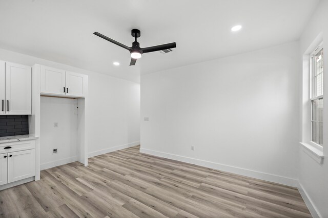 8209 Richland St A/B, Unit A/B Houston, TX 77028 - unfurnished living room with light wood-style flooring, a ceiling fan, baseboards, and recessed lighting