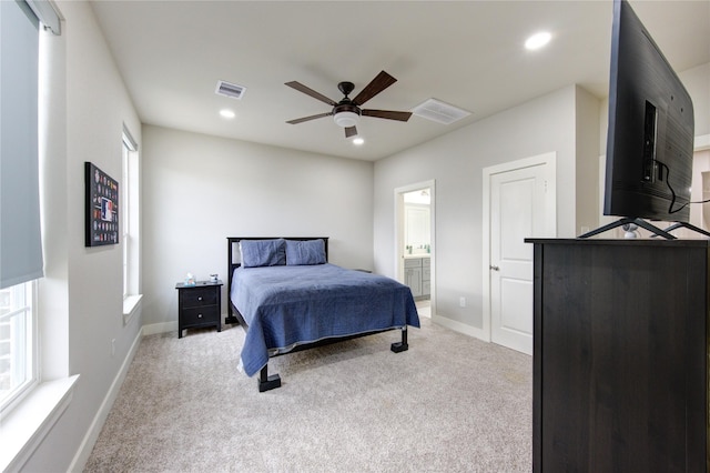 14514 Sanour Dr, Houston, TX 77084 - carpeted bedroom with baseboards, recessed lighting, ensuite bath, and ceiling fan