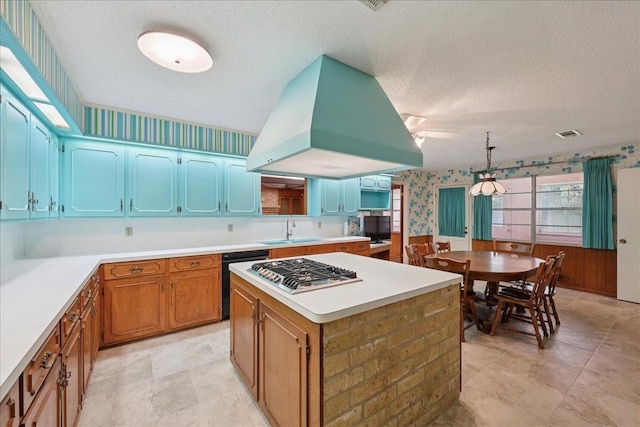 5210 Linda Ln, Beaumont, TX 77708 - kitchen featuring a sink, island range hood, wallpapered walls, dishwasher, and a kitchen island