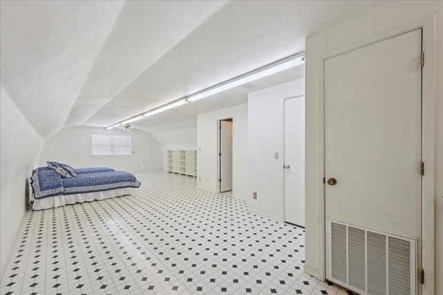 5210 Linda Ln, Beaumont, TX 77708 - unfurnished bedroom featuring vaulted ceiling