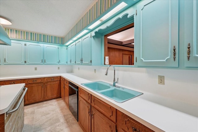 5210 Linda Ln, Beaumont, TX 77708 - kitchen with a sink, black dishwasher, stove, light countertops, and a textured ceiling