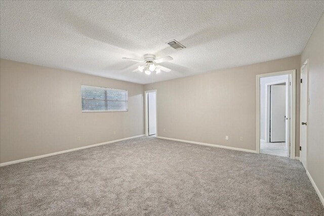 5210 Linda Ln, Beaumont, TX 77708 - empty room with ceiling fan, carpet, baseboards, and a textured ceiling