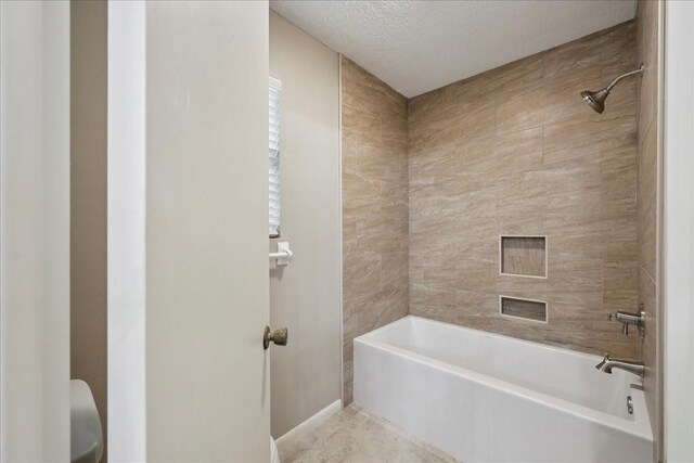 5210 Linda Ln, Beaumont, TX 77708 - bathroom featuring shower / tub combination and toilet