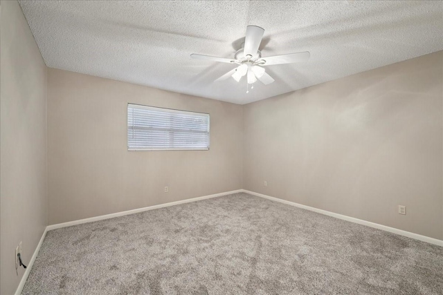 5210 Linda Ln, Beaumont, TX 77708 - carpeted empty room with a ceiling fan, baseboards, and a textured ceiling