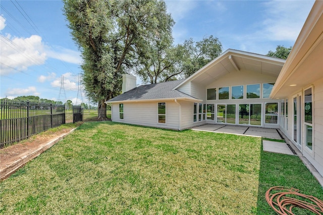 2702 Fairway Dr, Sugar Land, TX 77478 - back of house with a chimney and a patio area