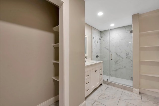 2702 Fairway Dr, Sugar Land, TX 77478 - bathroom featuring marble look tiles, recessed lighting, a marble finish shower, vanity, and baseboards
