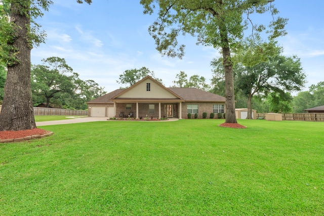 8518 Kerr Dr, Tomball, TX 77375 - view of front of home featuring concrete driveway, an attached garage, and brick siding