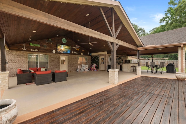 8518 Kerr Dr, Tomball, TX 77375 - wooden deck featuring an outdoor hangout area, an outdoor bar, and a ceiling fan