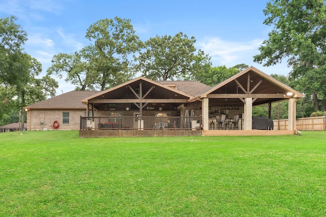 8518 Kerr Dr, Tomball, TX 77375 - rear view of house featuring a shingled roof, a patio, and brick siding
