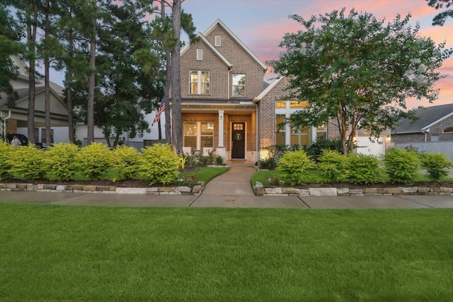 22 Hedgedale Way, Spring, TX 77389 - view of front of property featuring brick siding and a front lawn