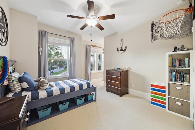 22 Hedgedale Way, Spring, TX 77389 - carpeted bedroom with a ceiling fan and baseboards