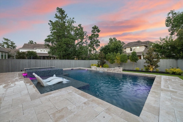 22 Hedgedale Way, Spring, TX 77389 - pool at dusk featuring a patio and a fenced backyard