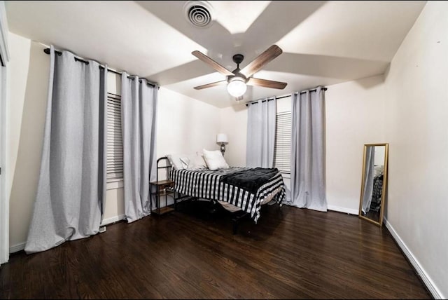 10305 Bassoon Dr, Houston, TX 77025 - bedroom with wood finished floors, baseboards, and ceiling fan