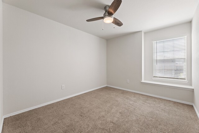 5710 Pampus Prairie Rd, Katy, TX 77493 - carpeted spare room featuring a ceiling fan and baseboards