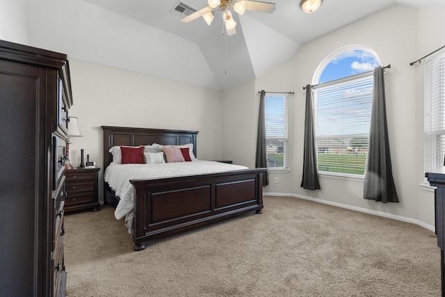 6411 St Placidia Dr, Spring, TX 77379 - bedroom featuring light carpet, lofted ceiling, a ceiling fan, and baseboards