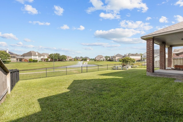 6411 St Placidia Dr, Spring, TX 77379 - view of yard featuring a residential view and a patio area