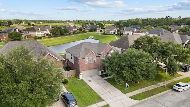6411 St Placidia Dr, Spring, TX 77379 - aerial perspective of suburban area featuring a large body of water