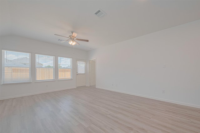 17722 Pamukkale Pl, Tomball, TX 77377 - unfurnished room featuring ceiling fan, light wood finished floors, baseboards, and lofted ceiling