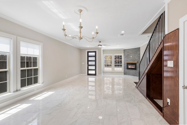 514 E 29th St, Houston, TX 77008 - unfurnished living room featuring a large fireplace, a chandelier, light marble finish floors, a ceiling fan, and crown molding