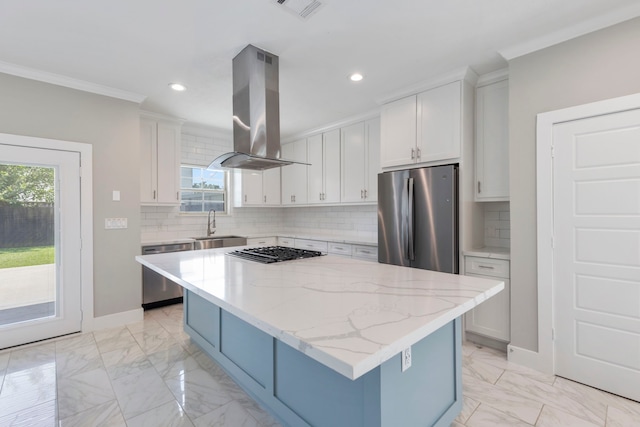 514 E 29th St, Houston, TX 77008 - kitchen featuring island range hood, stainless steel appliances, crown molding, recessed lighting, and a sink