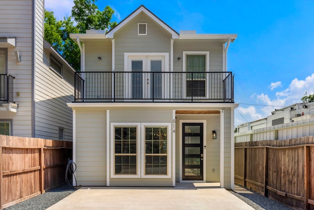 514 E 29th St, Houston, TX 77008 - back of house with a balcony, a fenced backyard, and a patio