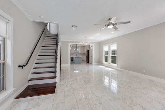 514 E 29th St, Houston, TX 77008 - stairway with ornamental molding, a ceiling fan, a chandelier, marble finish flooring, and baseboards