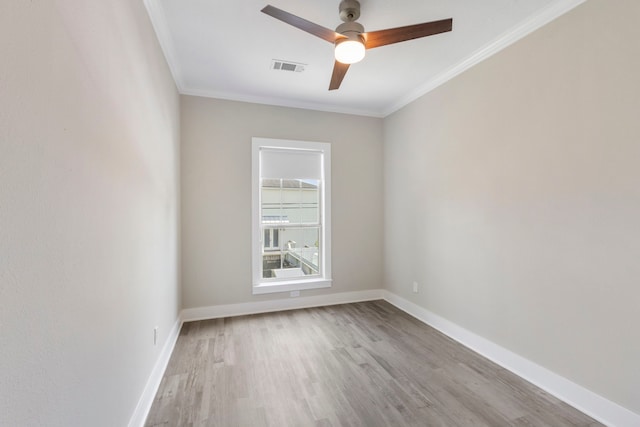 514 E 29th St, Houston, TX 77008 - empty room with a ceiling fan, wood finished floors, ornamental molding, and baseboards