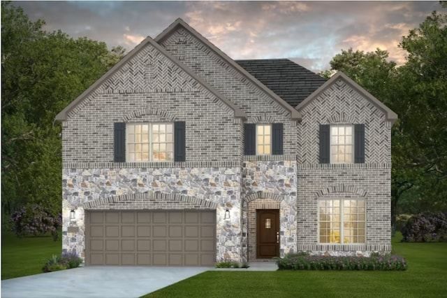5218 Mulberry Thicket Trl, Richmond, TX 77469 - french country inspired facade with a lawn, stone siding, concrete driveway, an attached garage, and brick siding
