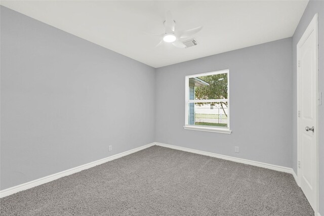 11423 Raincove Dr, Houston, TX 77016 - spare room with carpet, ceiling fan, and baseboards